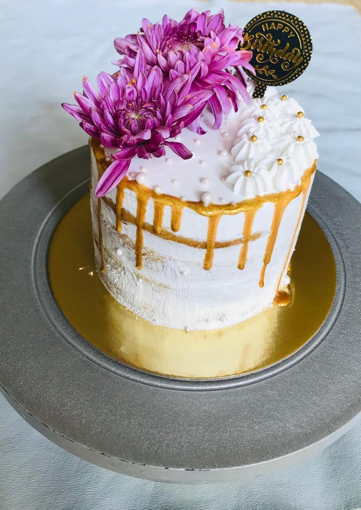 Semi Naked Cake with Fresh florals, Gold flake and Macarons | Cakes by Anna